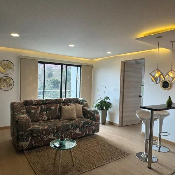 El Encanto - La Trinidad, cabaña con jacuzzi, hôtel à Duitama