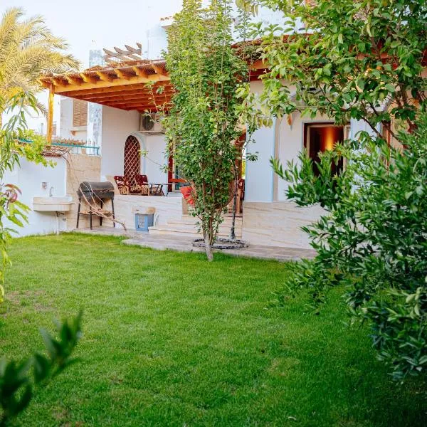 Tranquil Villa in Fayoum Private Pool Garden Lake Access, hotel u gradu 'Kaḩk al Baḩrīyah'