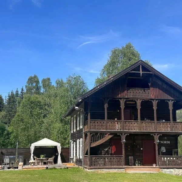 Nord-Garthus gård leilighet 1，位于Hølera的酒店