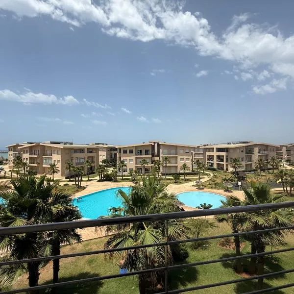 Résidence Kenz Mehdia - Très jolie appartement vue sur piscine, hotel in Kenitra