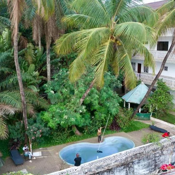 Pension Les Palmiers, hotel en Kipé