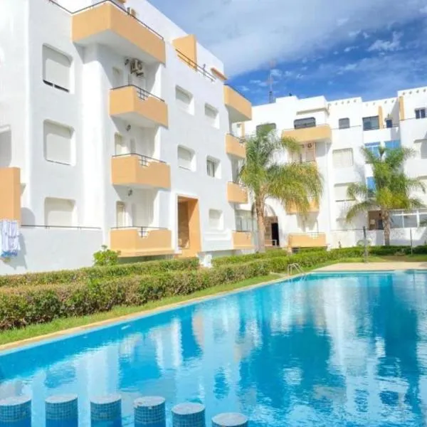 Appartement avec piscines, vue sur mer et accès à la plage à Achakar Hill, Tanger，位于丹吉尔的酒店