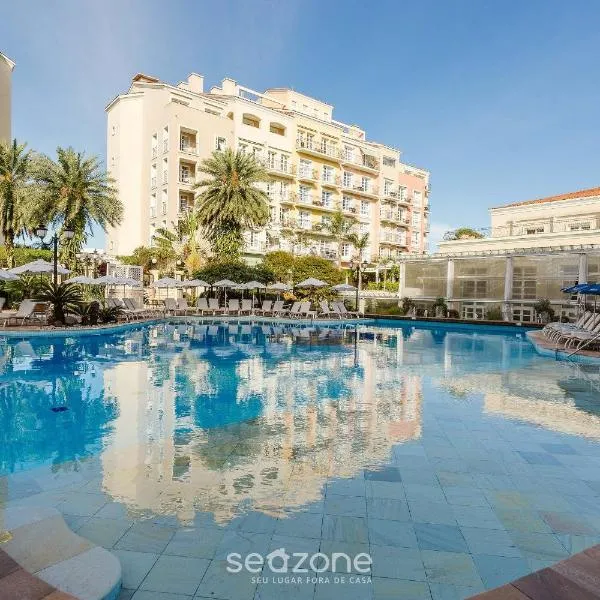Suíte com vista para praia dentro de hotel - Seazone ILCTOP, hotel em Florianópolis