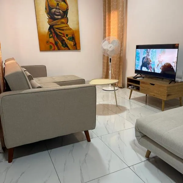 Appartement spacieux et cosy au coeur des 2 Plateaux, hôtel à Abidjan