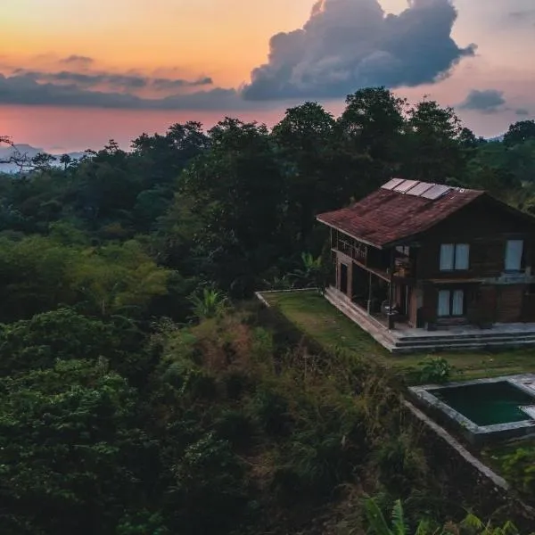 Master bed room in Bukit Cottage, hotel v destinaci Noca