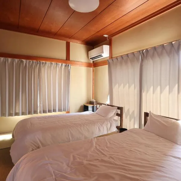 Guesthouse KEN, ξενοδοχείο σε Τογιάμα