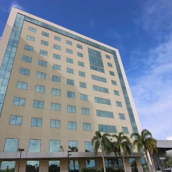 Quarto Hotel Econômico Linhares, hotel i Linhares