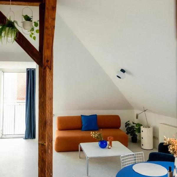 Zentrales Design-Apartment im Zentrum mit Schlossbergblick, hotel in Graz