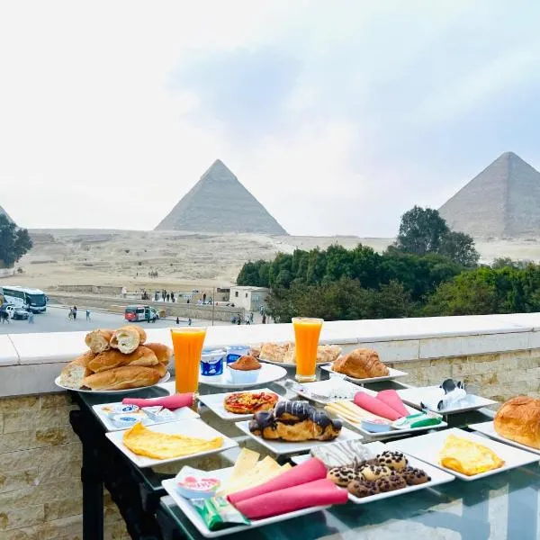 Sphinx Scarab Pyramids View，位于Giza的酒店
