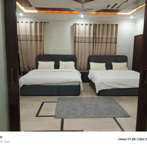 The Guest House Islamabad, хотел в Исламабад