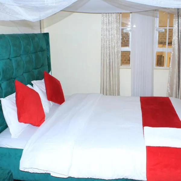 Grace Luxury Suites, отель в городе Kiserian