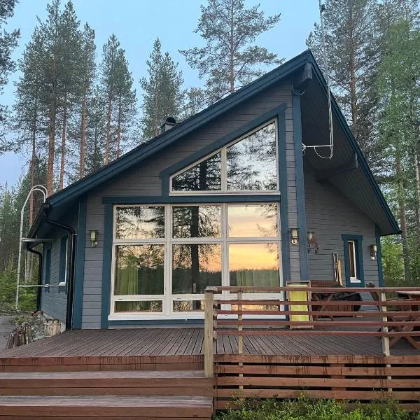 Villa Miilu Iso-Syöte hirsimökki järven rannalla, hotel di Syöte