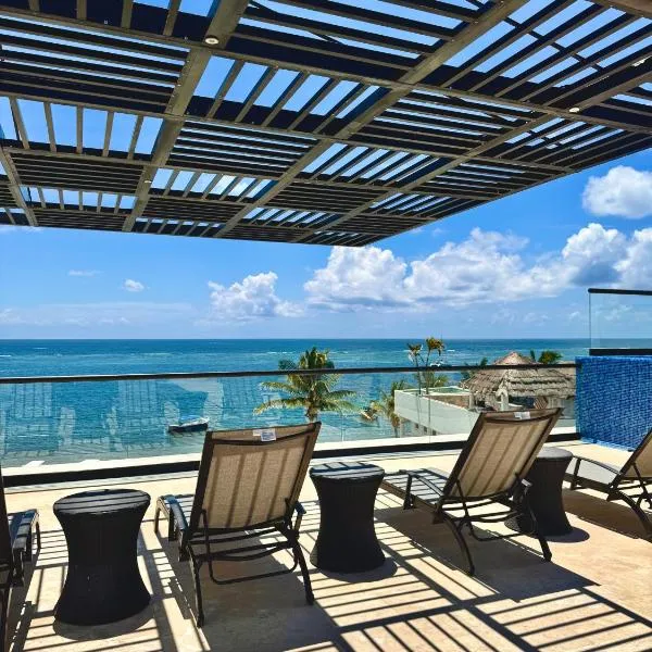 Bright Ocean View Studio with Rooftop Pool Access, ξενοδοχείο σε Puerto Morelos