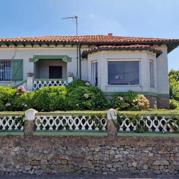 Chalet con jardín y vistas al mar, hotel v destinaci Suances