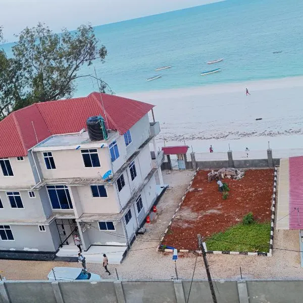 Spacious 2BR Beachfront Apartment - Ocean View, Balcony, AC, WiFi - Uroa Zanzibar, hotel em Uroa