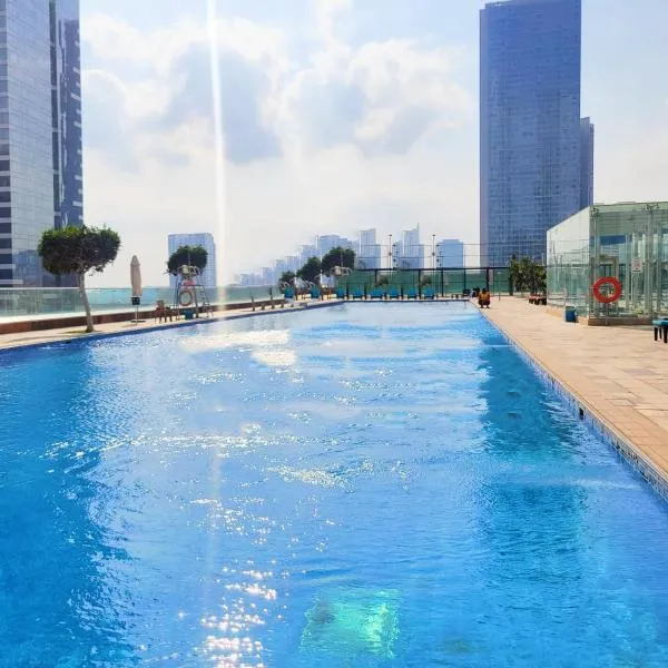 Pearl Club Al Reem Island 2 Bedrooms With Pool , Gym and Tennis Court, hotel i Abu Dhabi