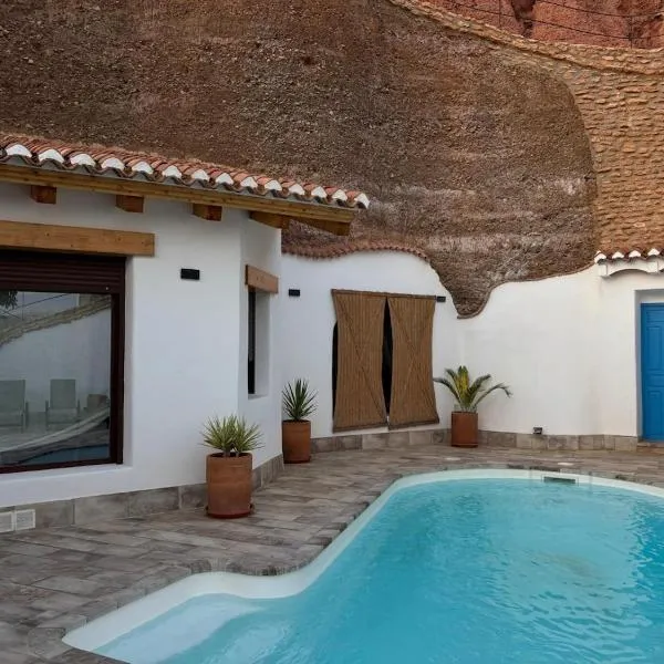 Cueva con vistas a Sierra Nevada en Alcudia de Guadix, hôtel à Alcudia de Guadix