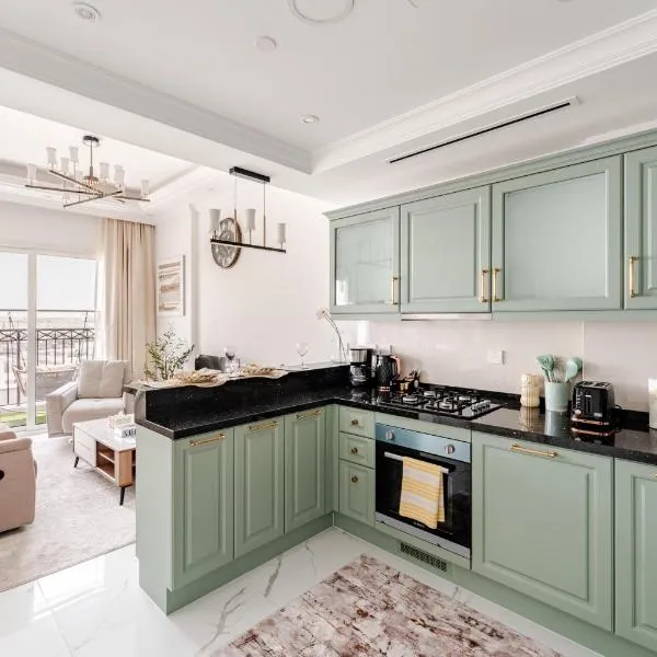 Luxury 1BR with Lagoon View- Miracle Garden, hotel in Dubai