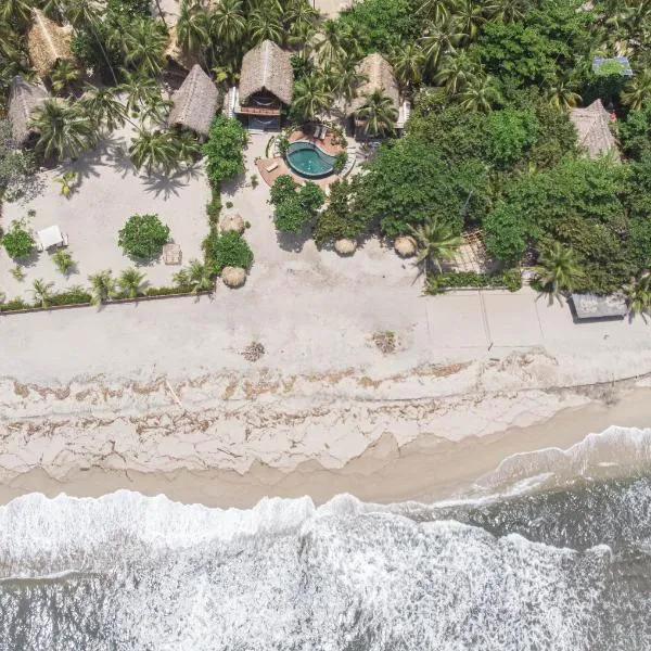 Casa Iwana Tayrona Suites Deluxe Playa y AC, Hotel in Guachaca