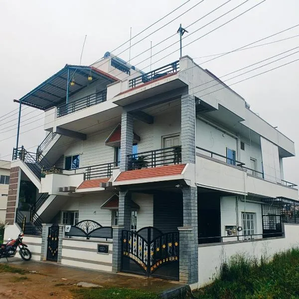 Happy Holiday inn service apartment, hotelli kohteessa Chikmagalūr