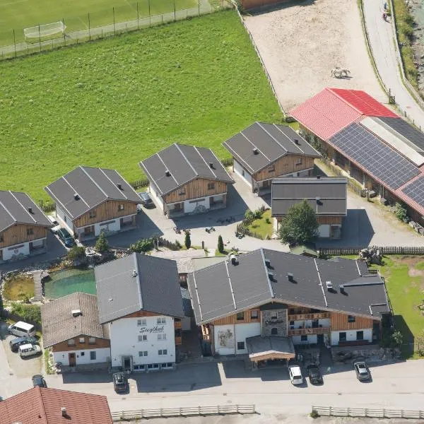 Sieglhub Chalets - Appartements - Hotel, hotel ve Flachau