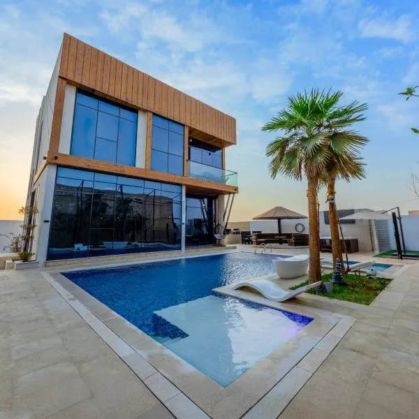 Nagawa Staycation, hotel in Ḩaşat al Bidīyah