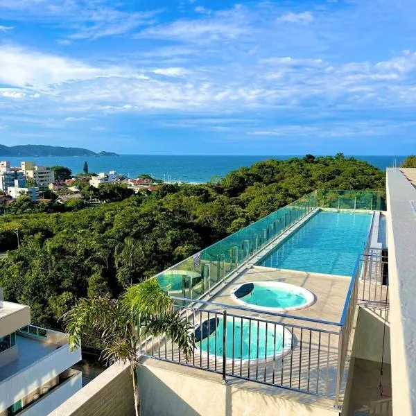 Promoção em Bombinhas até 4 pessoas c Piscina Aquecida, hotel i Bombinhas