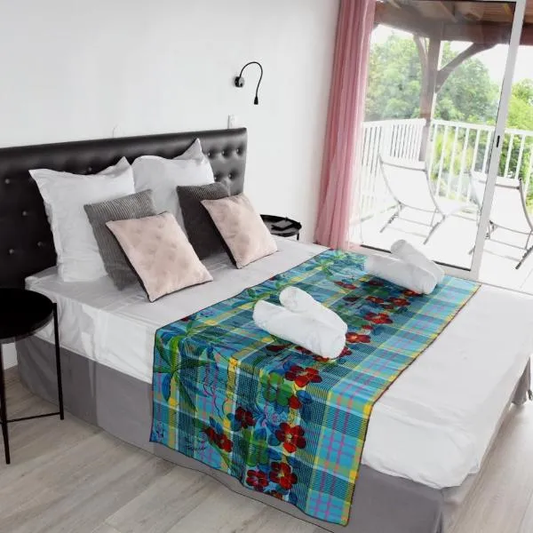 Duplex Rose Porcelaine - Vue Mer- Malendure, hotell sihtkohas Bouillante