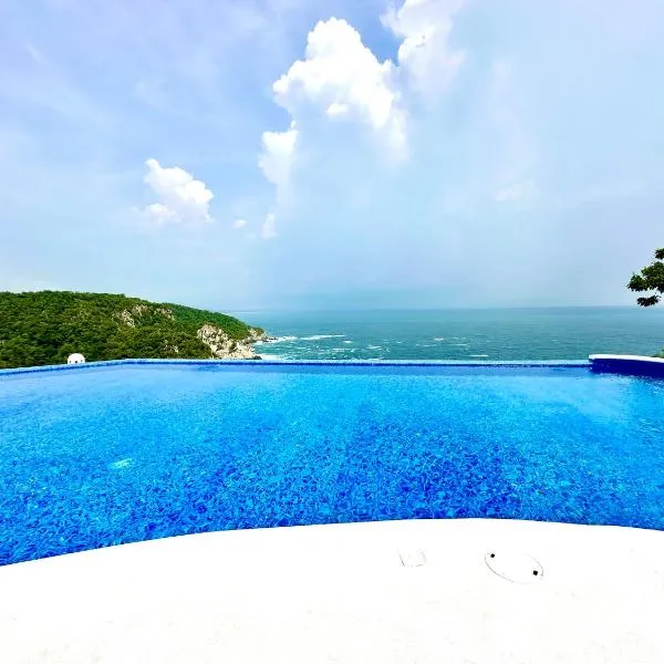 Bungalow frente a la playa estrene alberca nueva con increíble vista infinita al mar, 8 hermosas playas cercanas, terraza con cama de playa, espectacular vista al inmenso océano pacífico, 2 kayack disponibles, nómadas digitales Starlink WiFi 224 mbps, hotel v destinaci Puerto Ángel