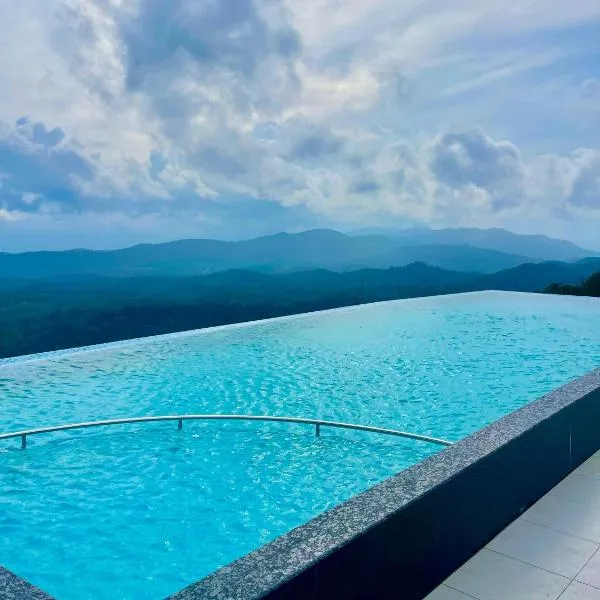 kollanoor guest house，位于马迪凯里的酒店