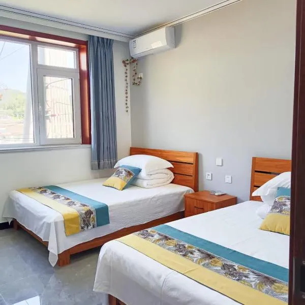 Jinshanling Great Wall聚友缘民宿, hotel in Gubeikou