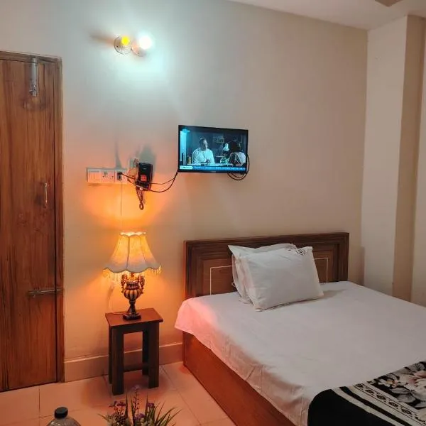 Hotel Sikder Residential - হোটেল শিকদার আবাসিক، فندق في Bisil