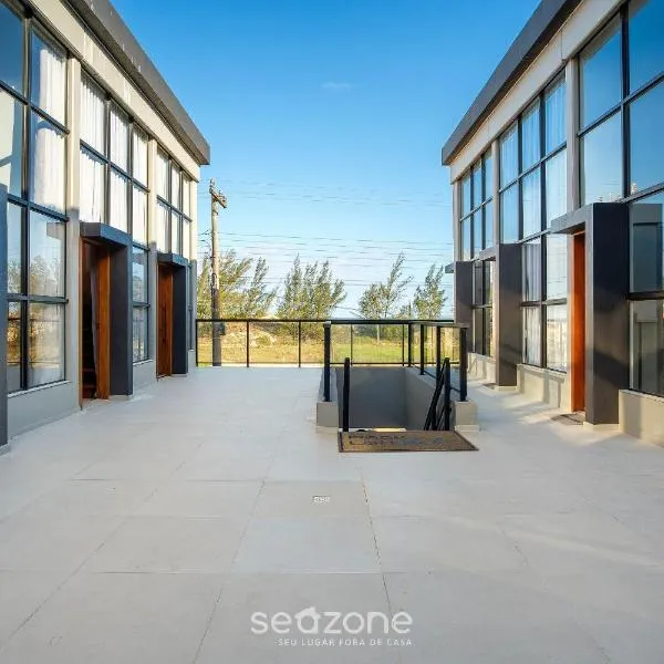 Lofts completos e modernos em Jaguaruna a 50m da Praia - PLO, hotell sihtkohas Camacho