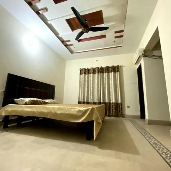 Comfy Stay Inn, khách sạn ở Faisalabad