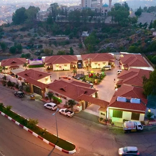 شاليهات مدينة الحدائق لبيوت العطلات، فندق في بلجرشي