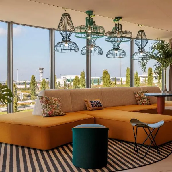 Hampton By Hilton Lyon Airport, hotel v destinaci Colombier-Saugnieu