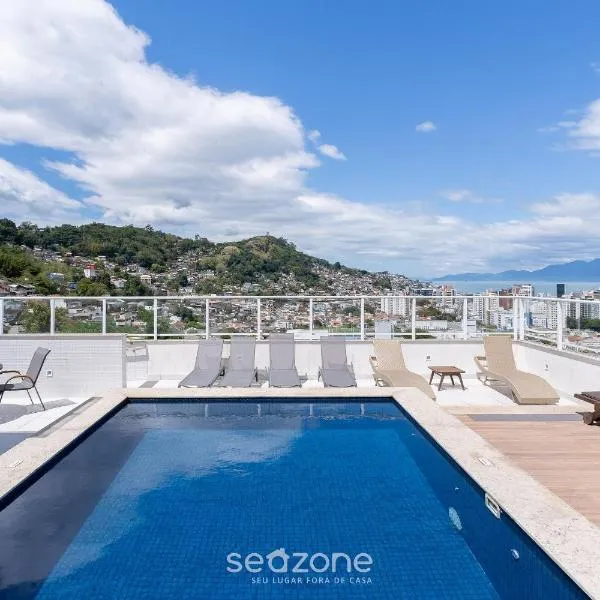 Aptos completos em prédio com piscina a 850m da Praia no Centro de Floripa - RIIs, hotel em Florianópolis