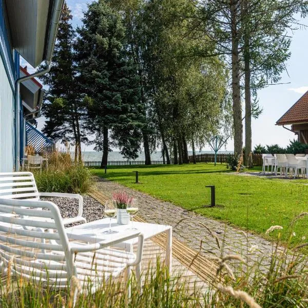Viesnīca Saulės apartamentai su vaizdu į Kušių marias Neringā