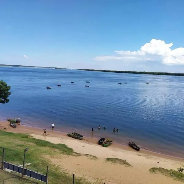 Atardecer Ituzaingó Cabaña frente al río, hotel a Ituzaingó