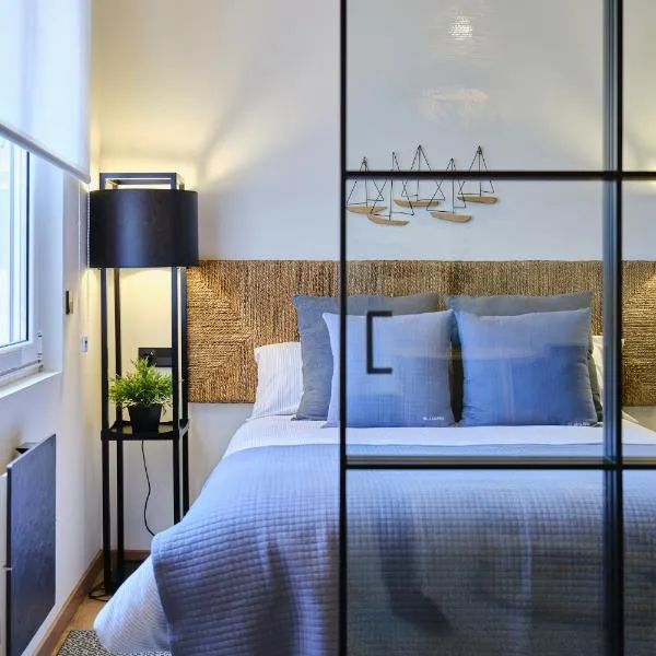 El Amarre - Apartamento boutique camarote frente a la playa - Grupo Querbes、ヒホンのホテル