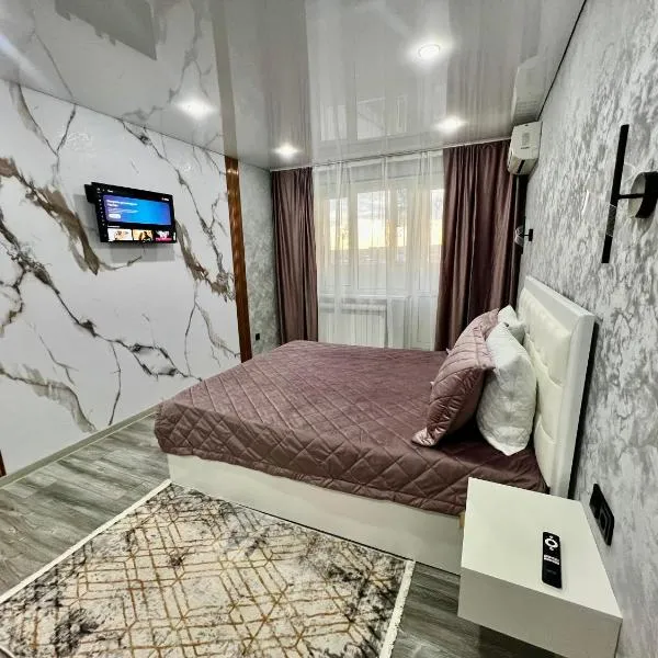 Элитная квартира возле керуен сити , 11 мкр, hotel a Aqtöbe