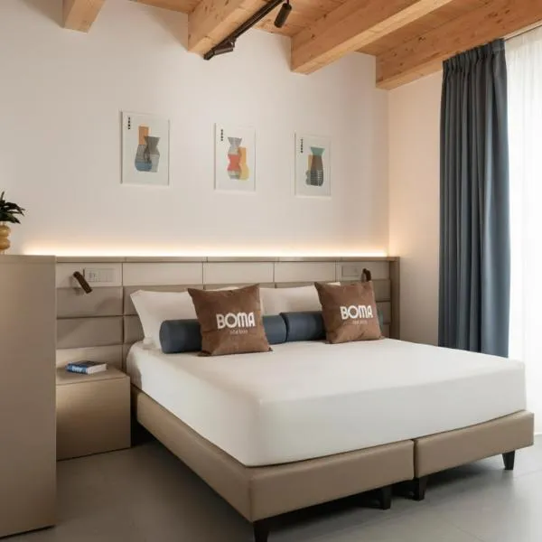 BOMA Prime Rooms, готель у місті Чивітанова-Марке