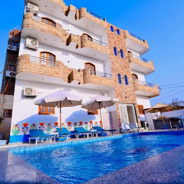 Sun wing guest house，位于卢克索的酒店