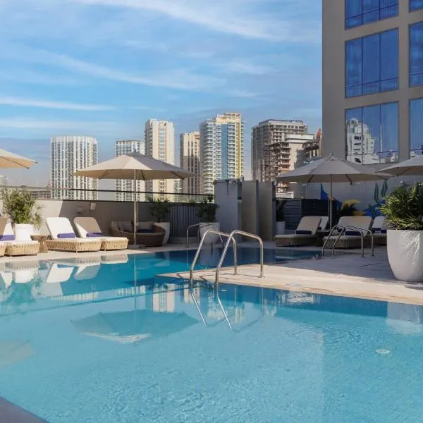 Holiday Inn Dubai Village Circle by IHG, hôtel à Dubaï