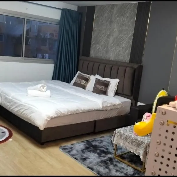 อิมแพ็ค popular condo c5 แม่ตังค์, hotel in Ban Bang Phang