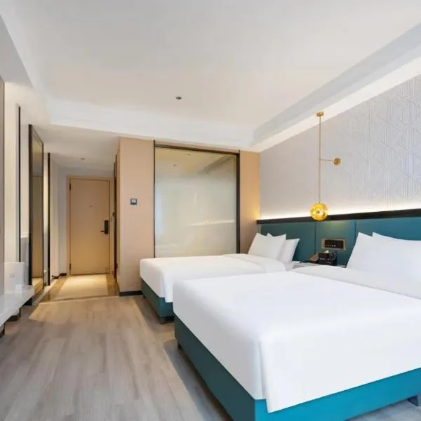 Meisu Huanman Hotel Nanhu Square Branch, хотел в Yueyang