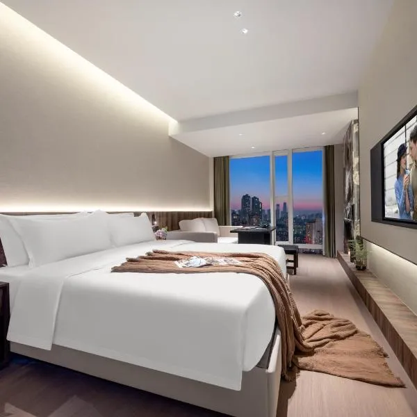 重庆伯特高空酒店江北嘴洪崖洞店Chongqing Bert High-Altitude Hotel Jiangbeizui Financial Center Branch, מלון בצ'ונגצ'ינג