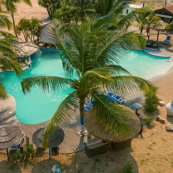 Netu's Village Resort, hotel in Belas