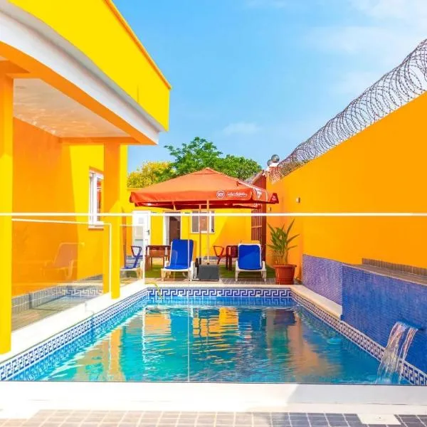 Saton 24H Guest House, hotel di São Tomé