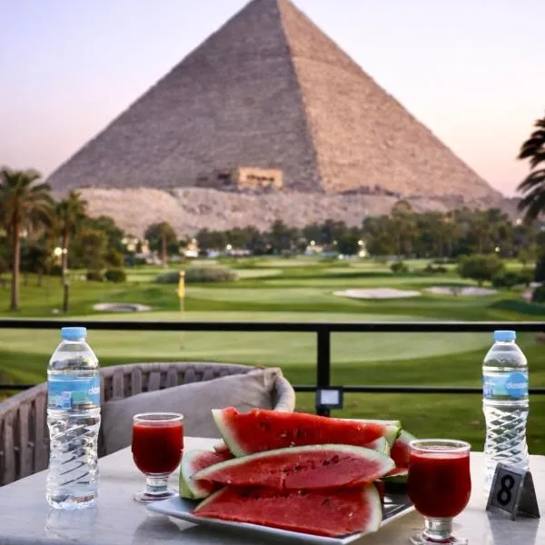 Dayy Pyramids View Hotel, hotel en El Cairo